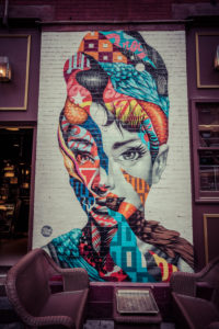 Colorfull Wall painting of Audrey Hepburn, Italian restaurant, Little Italy, Manhattan, New York, USA Colorfull Wall painting of Audrey Hepburn, Italian restaurant, Little Italy, Manhattan, New York, USA